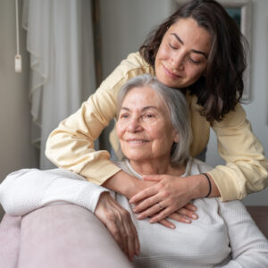 Daughter Hugging Senior Mother For Love Bonding Together